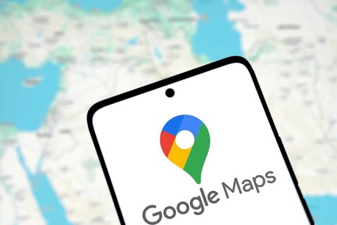 Google maps logo is displayed on smartphone