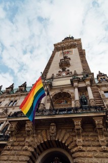 Hamburg Town Hall or Rathaus during Gay Pride Parade. Low angle view against sky