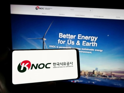 Stuttgart, Germany, 11-16-2023: Person holding smartphone with logo of petroleum company Korea