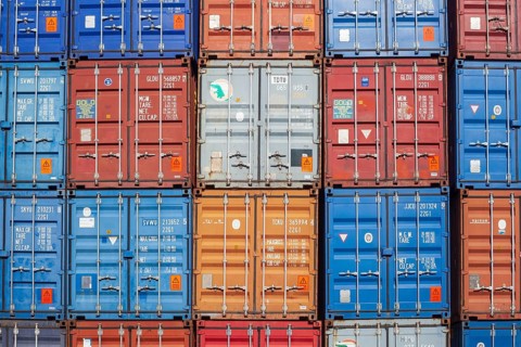 Stacked colourful freight containers at the container terminal in Holz-und Fabrikenhafen, Bremen,