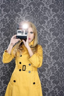 Fashion photographer retro camera reporter woman vintage wallpaper yellow coat
