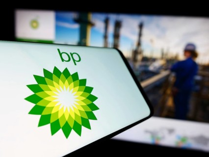 Stuttgart, Germany, 11-16-2023: Cellphone with logo of British oil and gas company BP plc in front