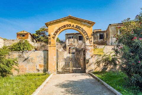 Only this gate remains as a reminder of Italy's most important seaplane airport in front of the