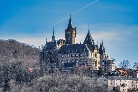 A view of the castle in Wernigerode under a blue sky