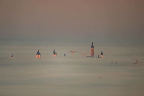 The towers of the town of Straubing (Lower Bavaria) in the morning mist