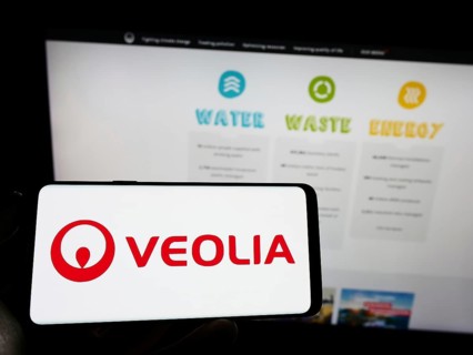 Stuttgart, Germany, 01-15-2023: Person holding cellphone with logo of French company Veolia
