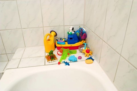 Children's toys on a bathtub