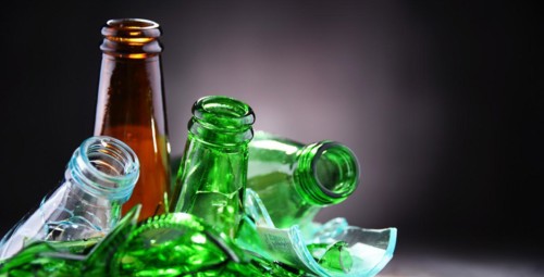 Broken glass bottles and pieces of glass. Recycling