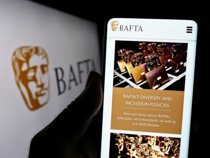 Stuttgart, Germany, 07-14-2023: Person holding cellphone with webpage of British Academy Film