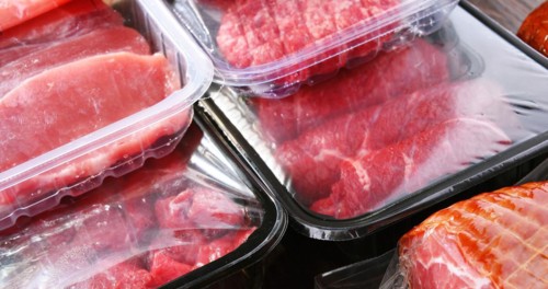 Composition with packages of assorted meat products