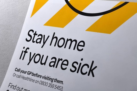 Signage warns people to keep social distancing during the Covid 19 lockdown in New Zealand, 2020