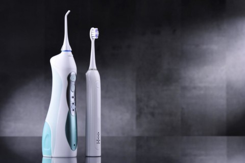 Oral irrigator and electric sonic toothbrush