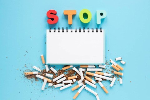 Top view notebook with colorful word cigarettes
