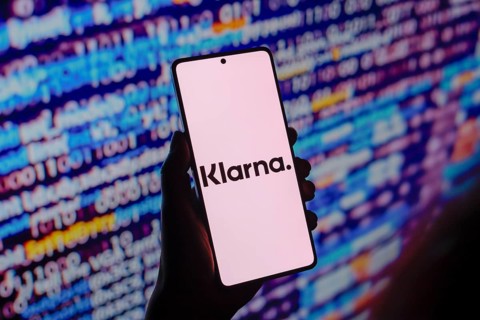 In this photo illustration, the Klarna Bank AB logo is displayed on a smartphone screen