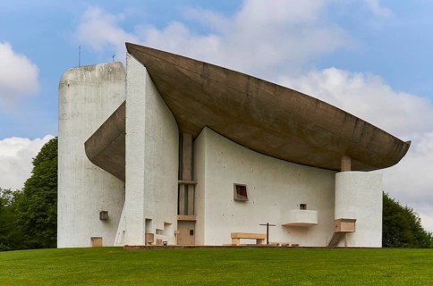 Modern church by Le Corbusier with striking concrete roof construction. Notre Dame du Haut chapel