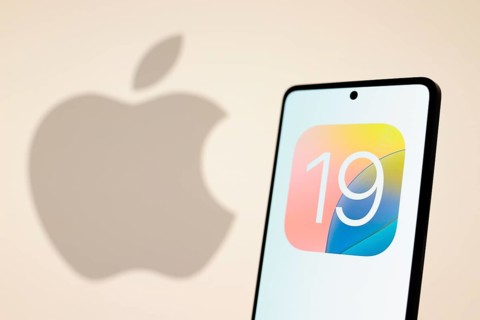 In this photo illustration, the iOS 19 logo seen displayed on a smartphone with an Apple logo in