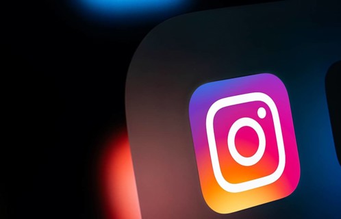 A close up of an iPad screen displaying the instagram app icon