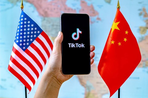 Calgary, Alberta, Canada. Sep 8, 2020. A person holding an iPhone with the TikTok app screen next