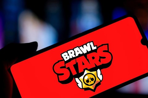 brawl stars logo is displayed on smartphone. Brawl Stars is a multiplayer online battle arena video