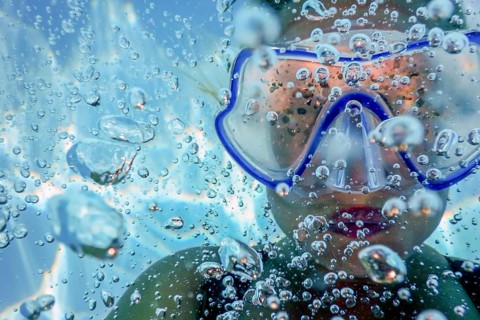 Underwater Woman Snorkeling Mask Bubbles Close Up Portrait, Swimming Pool, Vacation, Fun, Lifestyle