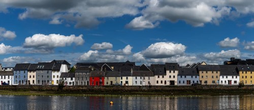 Galway, Ireland, 28 July, 2022: view of the River Corrib and the Long Walk Street with its colorful
