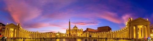 Panoramic view of St. Peter's Basilica and Square in Vatican City at sunset time