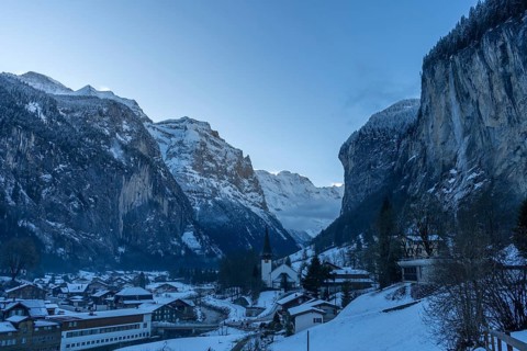 Lauterbrunnen Valley and Snowy Mountains in Winter Morning. Swiss Alps. Switzerland