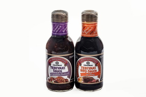 WETZLAR, Germany - 2022-07-17: Two Bottles of Kikkoman Teriyaki Sauce. In 1917 the Japanese Mogi