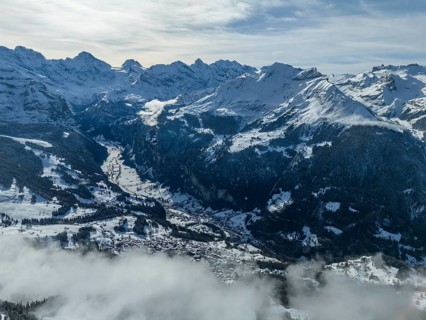 Lauterbrunnen Valley and Snowy Mountains in Winter. Swiss Alps. Switzerland. Aerial View over