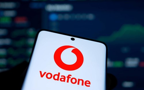 Vodafone logo is displayed on smartphone.