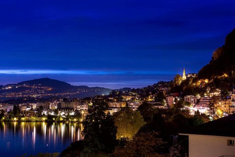 Switzerland, Montreux, cityscape dusk night view with Lake Geneva and Alps, Europe