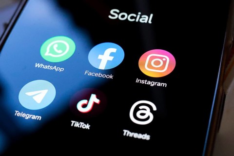 In this photo illustration, WhatsApp, Facebook, Instagram, Telegram, TikTok and Threads apps