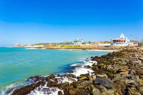 Landscape view of Kamarajar and Gandhi Memorial Mandapam on the coastline of Kanyakumari on a sunny