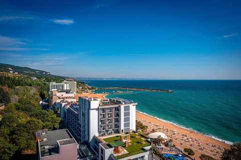 View of a hotel on the beach overlooking the Black Sea under a blue sky, Golden Sands, Varna,