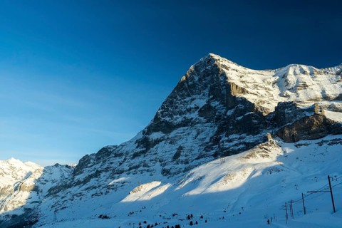 Eiger North Face Mountain at Sunset in Winter. Swiss Alps. Switzerland