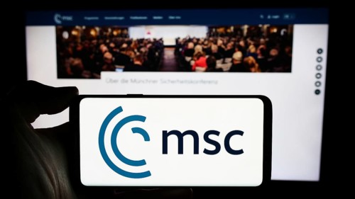 Stuttgart, Germany, 03-06-2024: Person holding cellphone with logo of annual event Munich Security