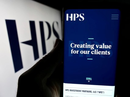 Stuttgart, Germany, 04-13-2024: Person holding mobile phone with website of US company HPS