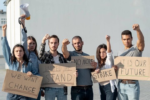Group protesters marching together