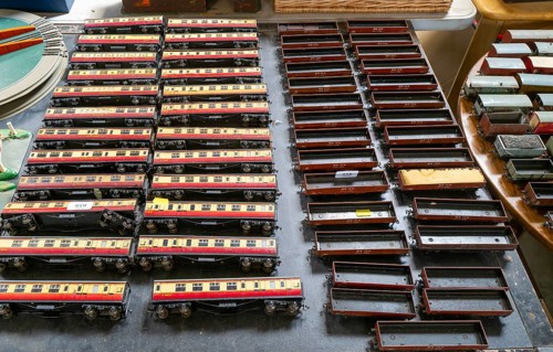 Model railway toy train set items on display for sale at auction room, UK