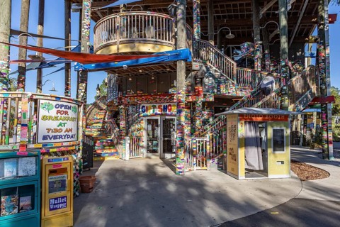 Tacky Jacks bar and restaurant decorated with strips of brightly colored stickers where guests