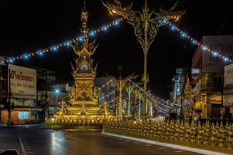 Clock Tower of Chiang Rai monument designed by local artist Chalermchai Kositpipat to honor the