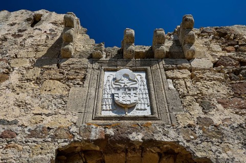 Coat of arms of the Grand Master del Carretto, close-up of a stone relief with coat of arms on an