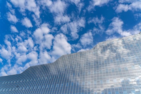 Reflecting facade of the Rabobank building at the central station, Utrecht Centraal, Netherlands