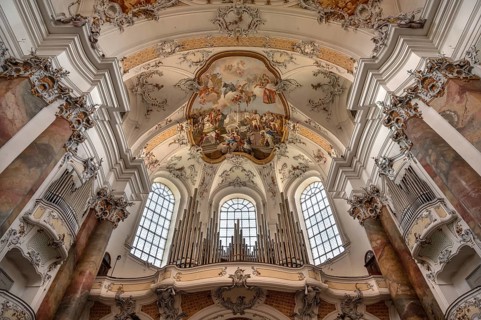 Organ loft and vault with ceiling frescoes in the baroque Basilica of St Alexander and Theodor,
