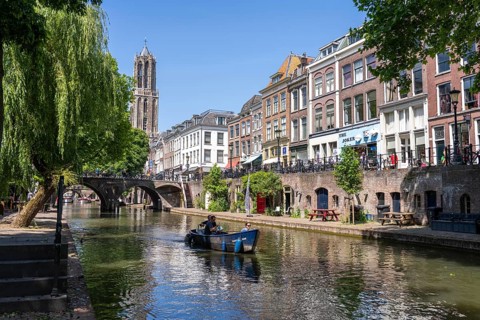 The old town centre of Utrecht, Oudegracht, around 2 km long with many old houses, cathedral tower,
