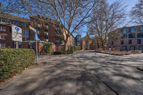 Street, general architecture, pavement, paving slabs, bare wintry trees, fenced-off construction