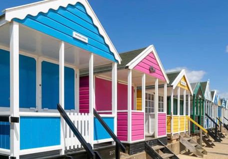 Seaside beach huts on the seafront at Southwold, Suffolk, England, UK