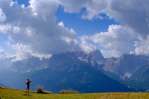 Mountaineer on the helmet, view of the Sesto sundial, Sesto, Dolomites, Val Pusteria, South Tyrol,