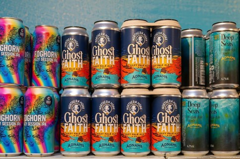 Adnams beer products on display inside brewery shop, Southwold, Suffolk, England, UK - Ghost Faith