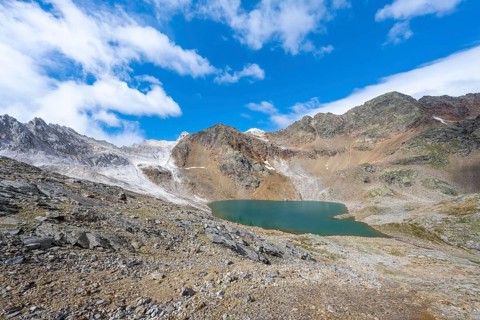Mountain landscape with limestone cliffs between granite mountains, Hinterer Senner Egetsee